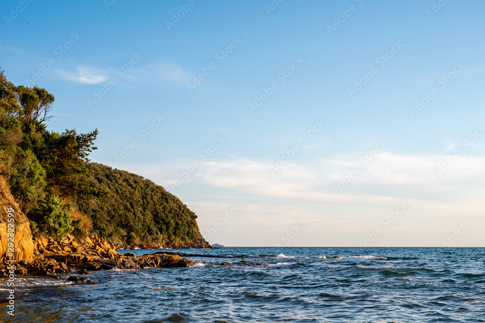 Mediterranean landscape seen from the beach of Cala Violina, Tuscany