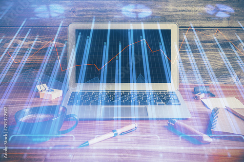 Double exposure of forex graph and work space with computer. Concept of international online trading.