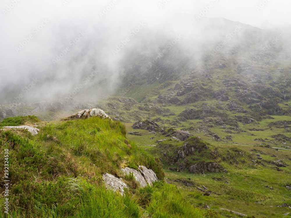 Valley with mist on kerry peninsula in ireland