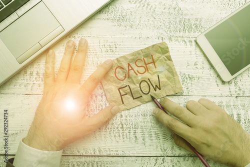 Handwriting text writing Cash Flow. Conceptual photo Movement of the money in and out affecting the liquidity photo