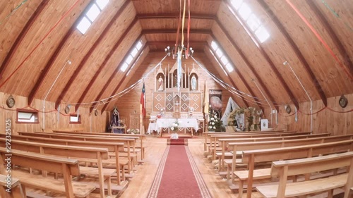 CHILOE ISLAND, CHILE - CIRCA FEBRUARY 2019: Inside of a wooden church of Chiloé island represent a unique example in Latin America of an outstanding form of ecclesiastical wooden architecture. 4k photo