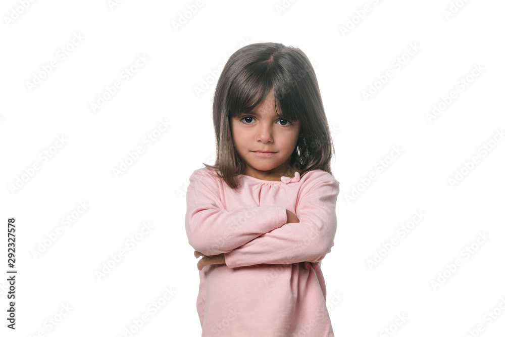 Portrait of a little brunette girl posing isolated on white background. Portrait of a little brunette girl posing isolated on white background.