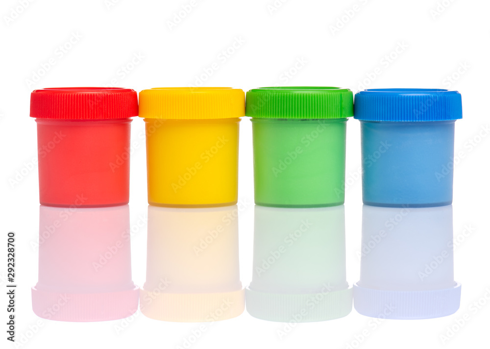 Set of Colorful Gouache jars isolated on white background with copy space. Cans of different colors gouache paints. Set of Colorful Gouache jars isolated on white background with copy space. Cans of different colors gouache paints.