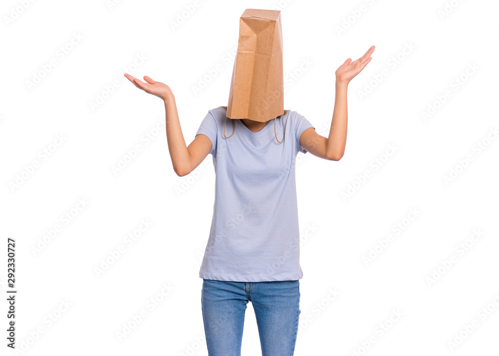 Teen girl with paper bag over her head showing helpless gesture with