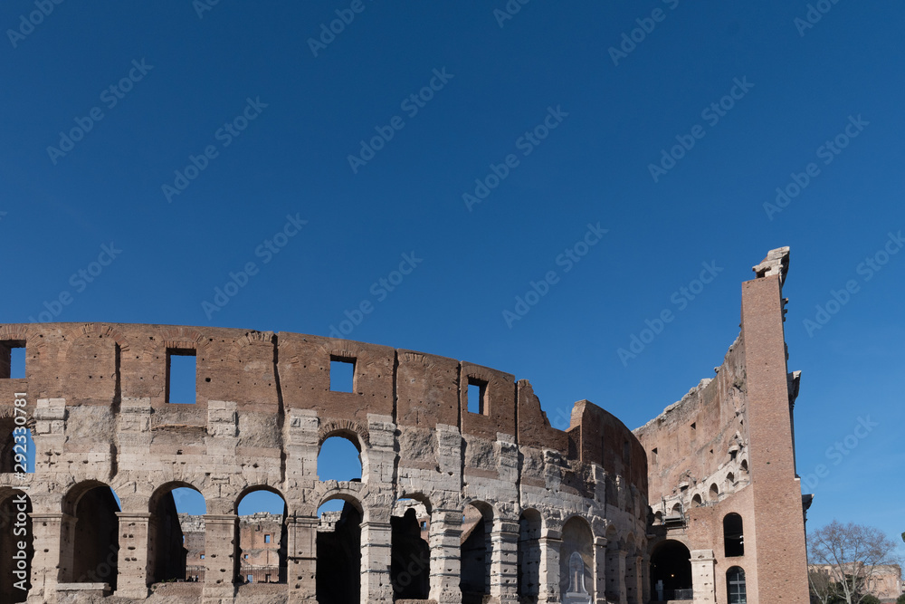 Partial view of the Coliseum in Rome, also known as the Flavian Amphitheatre