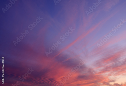 Sunset sky with orange clouds. Nature background.