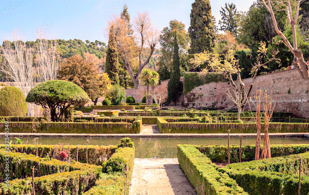 Gardens of the Alhambra monument in the spanish city of Granada in a sunny day.