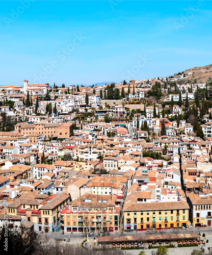 Aerial view of Granada to the river Darro surrounded by buildings in the south of Spain © Tomas
