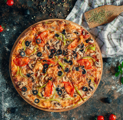 Italian pizza with mushroom  tomato  olive and cheese