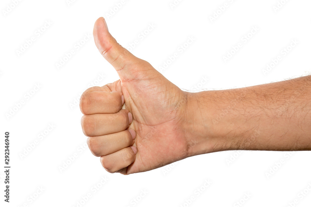 Hand of a men making a thumbs up gesture isolated on white background. Hand of a men making a thumbs up gesture isolated on white background.