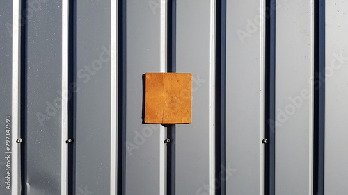Metal sheet for roofing and background wall. Curve metal texture, table of steel sheet. Selective focus Texture for art backdrop add text or graphic design. Corrugated metal sheet door in silver