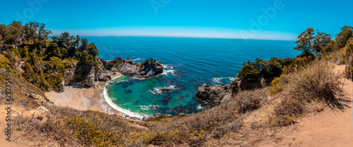 Panoramic of the Mcway Waterfall and its crystal clear water beach, California. United States