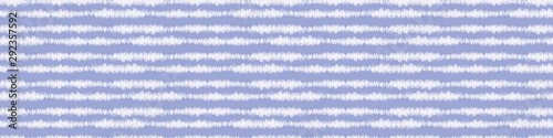 Tie dyed stripe variegated border background. Seamless pattern with inky dye drop spill. Bleached indigo blue ribbon trim blend, Trendy painted brushstroke wax line edging banner.