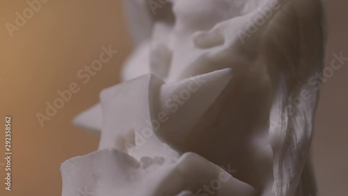 Wallpaper Mural Closeup on a white marble statue of the Greek god Hephaestus. Panning from down to high. Torontodigital.ca