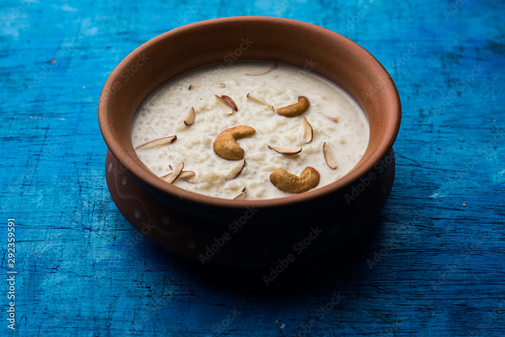 Rice Kheer or Firni or Chawal ki Khir is a pudding from Indian subcontinent, made by boiling milk ,sugar and Rice. Served in a bowl Rice Kheer or Firni or Chawal ki Khir is a pudding from Indian subcontinent, made by boiling milk ,sugar and Rice. Served in a bowl