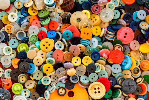 Fototapeta Naklejka Na Ścianę i Meble -  Close up of sewing colorful buttons background