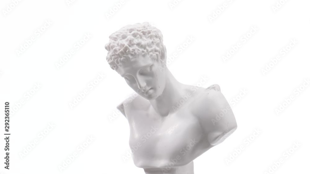 Old roman white marble statue rotating against a white background. Closeup shot Old roman white marble statue rotating against a white background. Closeup shot
