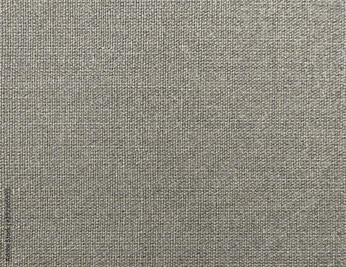 Textured background of grey natural textile