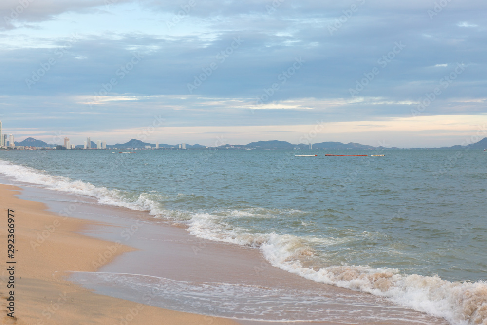 Sand beach water surf. Blue sea wave.