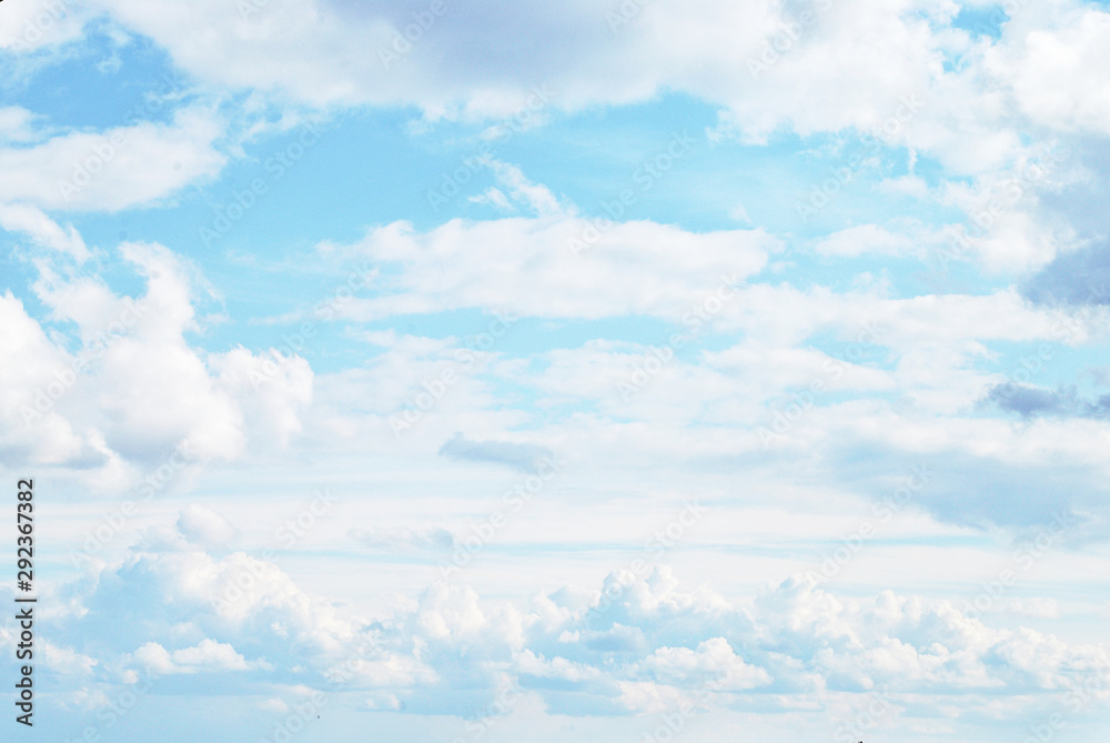 Beautiful clouds on the light blue sky in sunny weather day
