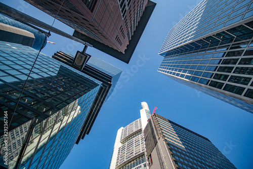 Frankfurt Skyscraper Omni Tower, Japan Center, Commerbank Tower and Taunusturm from below	 photo