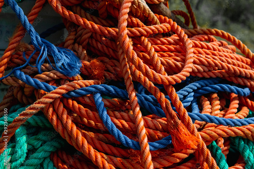 A pile of boat ropes in different colors