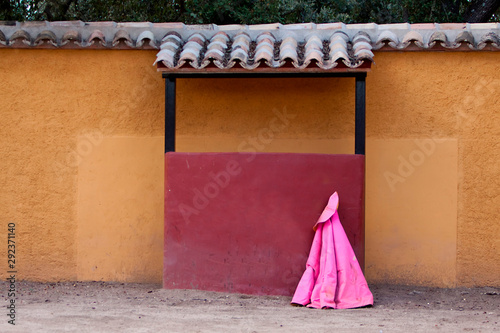 Small square of bulls or called tentadero, capote with a burladero, JaŽn, Andalusia, Spain photo