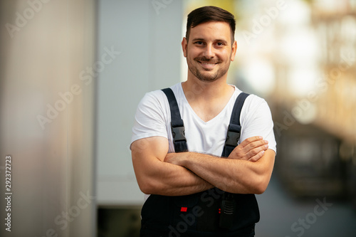 Portrait of handyman in uniform photo