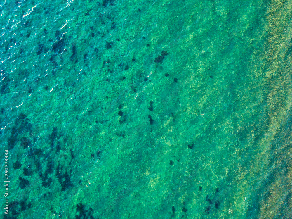 Aerial view of a seabed seen from above, sunset time, Adriatic sea, Montenegro