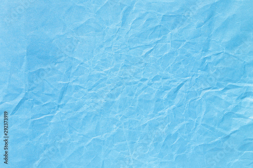 Blue crumpled paper background texture
