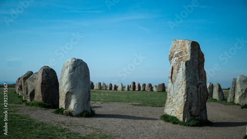 Landmark - Ale Stones (Ales stenar) old monument of stones. Photo taken inside the ring. A sunny summer day in Kåseberga, Sweden.