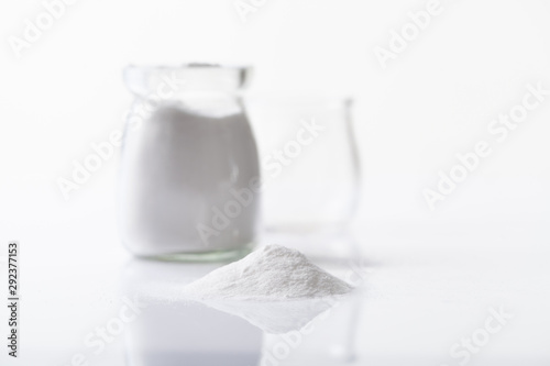 Jar with artificial sweetener aspartame E951 is harmful to health. photo