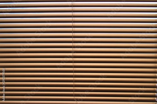 brown window blinds close up