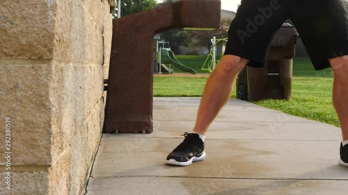 In shape man exercising, training, working out, doing medicine ball tosses in the morning, 60fps.
