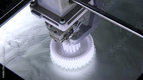 3D printer working. 3D printer printing an object from plastic. Automatic three dimensional 3d printer performs plastic. Progressive additive technology for 3d printing