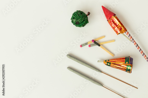 Different types of Diwali Firecrackers on isolated background with copy space. photo