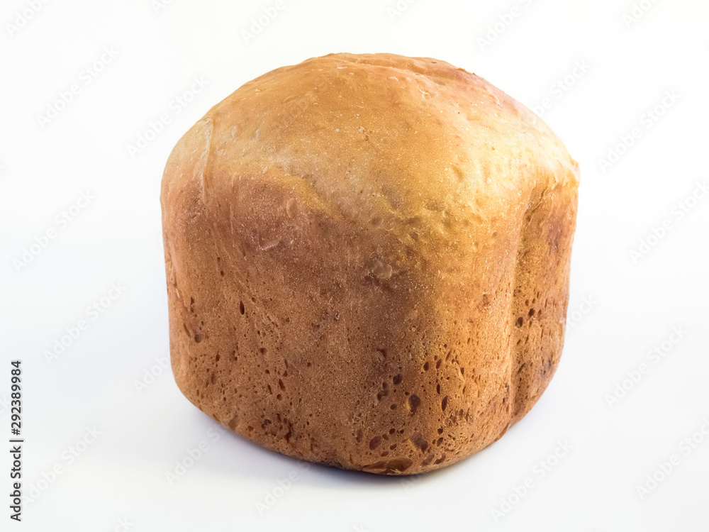 homemade white bread from a bread machine with a brown crust