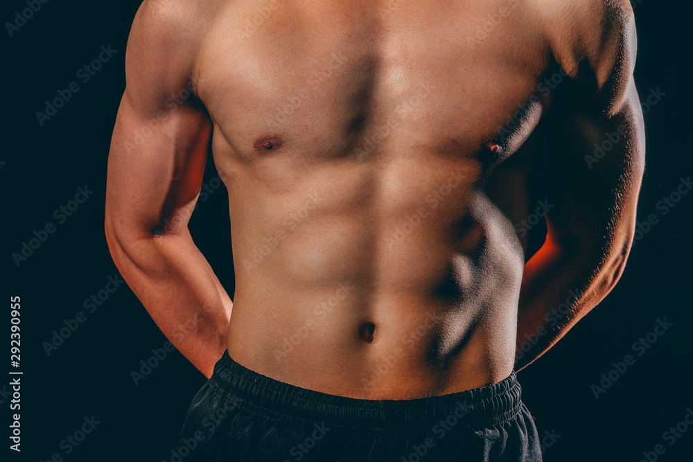 athletic muscular bodybuilder man with naked torso six pack abs. fitness workout concept athletic muscular bodybuilder man with naked torso six pack abs. fitness workout concept