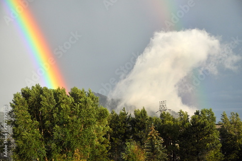 rainbow  trees and drifting cloud