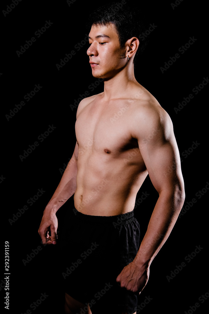 athletic muscular bodybuilder man with naked torso six pack abs. fitness workout concept athletic muscular bodybuilder man with naked torso six pack abs. fitness workout concept
