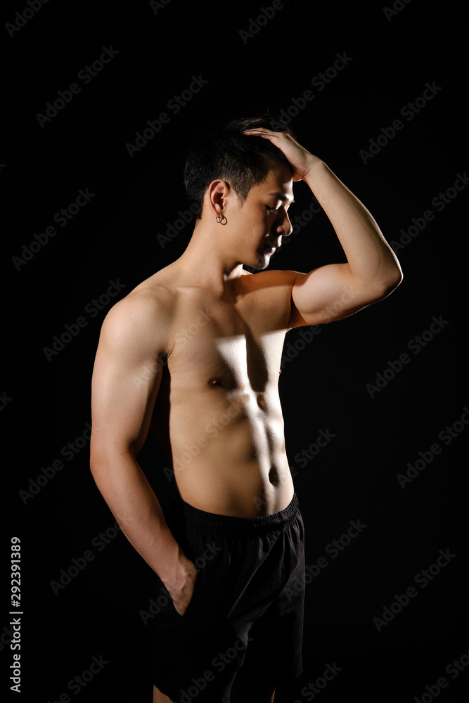 athletic muscular bodybuilder man with naked torso six pack abs. fitness workout concept athletic muscular bodybuilder man with naked torso six pack abs. fitness workout concept