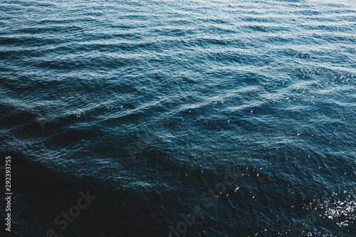 Blue water ripples texture with dark and light area
