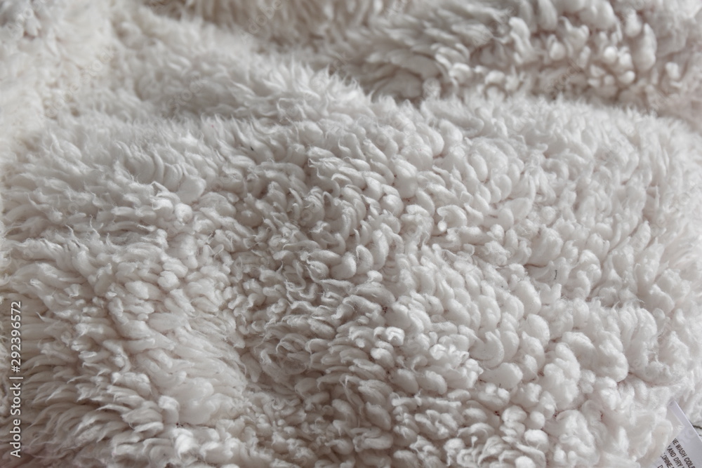 The texture of gray woolen knitted surface The texture of gray woolen knitted surface