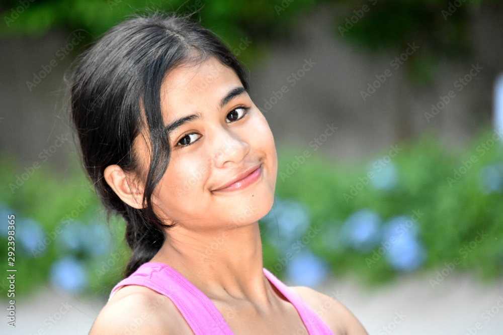 An A Smiling Young Teen Girl