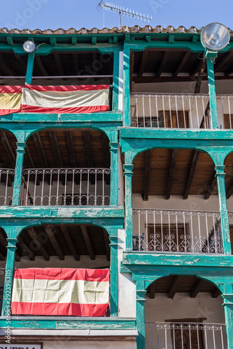 Detail of balconies typical of the century XIX, located in Main square, Touristic village in Madrid province, Chinchon, Spain