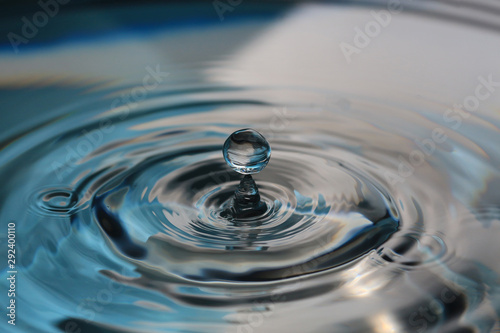 Water splash or drop. Water splash close-up. Blue water drop. Falling water