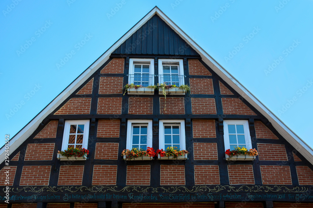 Traditional typical old house construction. Historic half timbered wooden german house facade. Traditional typical old house construction. Historic half timbered wooden german house facade.