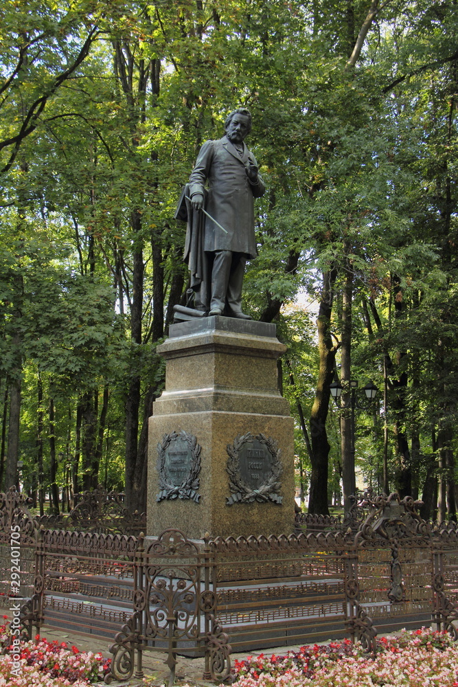 Smolensk, Russia, Statue of Great Russian composer Michael Glinka in Glinka Park on summer day, vertical photo
