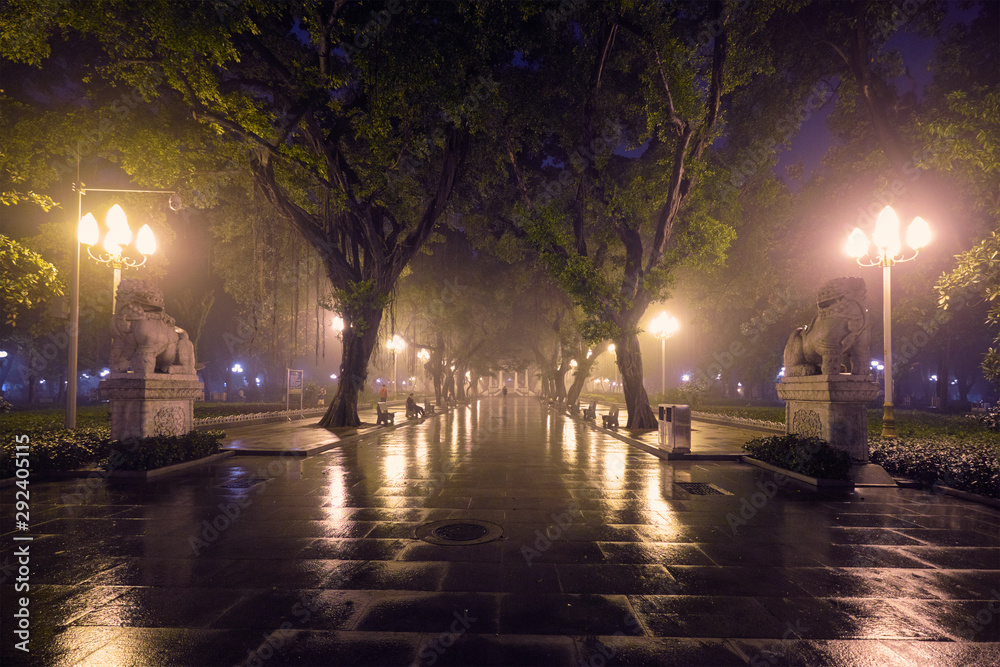 Guangzhou People's Park with fog at night, China