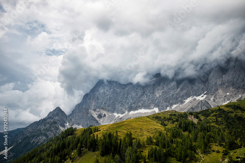 Obraz na płótnie Dramatic clouds over the Dachstein mountains, Alps in Austria w salonie